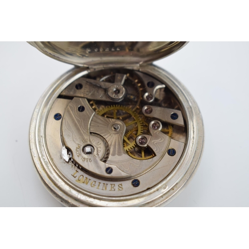 319 - Longines silver full hunter pocket watch marked .800 to inner case. White ceramic dial with Roman nu... 