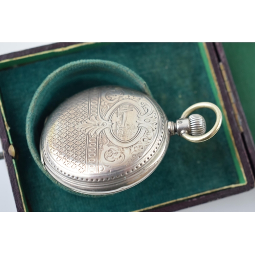 319 - Longines silver full hunter pocket watch marked .800 to inner case. White ceramic dial with Roman nu... 