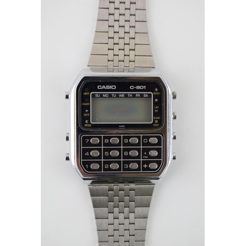 321 - Casio C-801 calculator watch on original stainless steel bracelet. Made in Japan. Serial number 9059... 