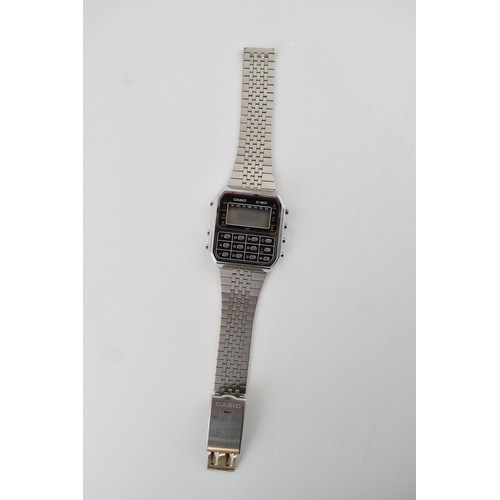 321 - Casio C-801 calculator watch on original stainless steel bracelet. Made in Japan. Serial number 9059... 