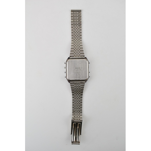 321 - Casio C-801 calculator watch on original stainless steel bracelet. Made in Japan. Serial number 9059... 