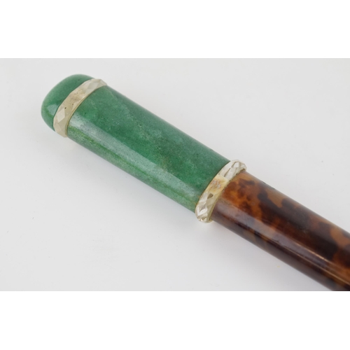 340 - A cane handle with tortoiseshell and jade or similar hard stone material with cut lead crystal segme... 