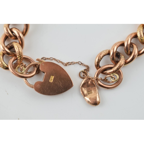 345 - A 9ct yellow gold bracelet with heart shaped padlock. weight 19.4 grams