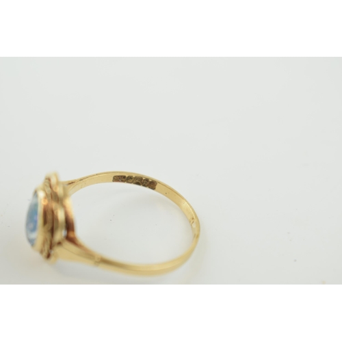 357 - 9ct gold and opal ring, stone badly scratched, and glued from behind. weight 3.3g.  Size W.