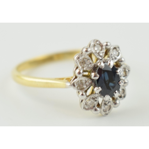 363 - 18ct gold ladies ring set diamonds and sapphire, 3.6 grams, size R.