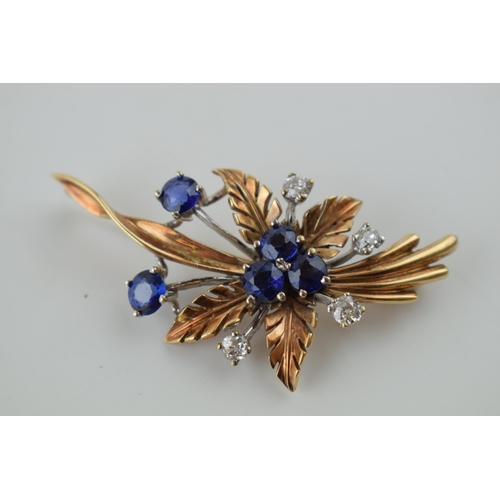 367 - A 9ct yellow gold floral spray brooch, claw set four old-cut diamonds and three round-cut sapphores ... 