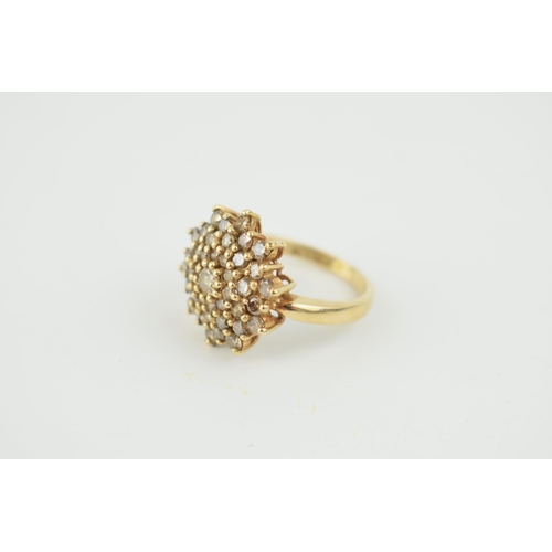 373 - 9ct gold diamond cluster ring, claw set champagne round-brilliant cut diamonds, stamped '9ct' and '1... 