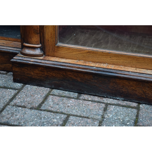 80 - An oversized 19th century mahogany breakfront sideboard credenza with central glazed cabinet, workin... 