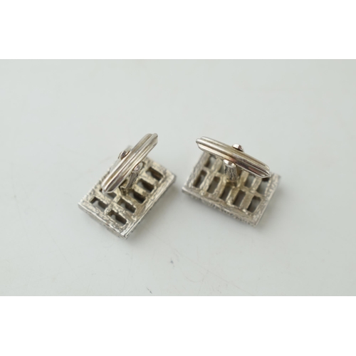 186 - A pair of sterling silver cufflinks with textured design, 14.4 grams (2).