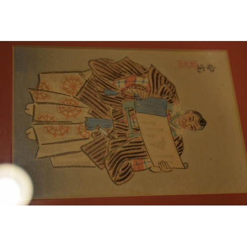 214 - Three framed oriental watercolour art works in red mounts and black lacquer frames. 21 x 26cm (3)