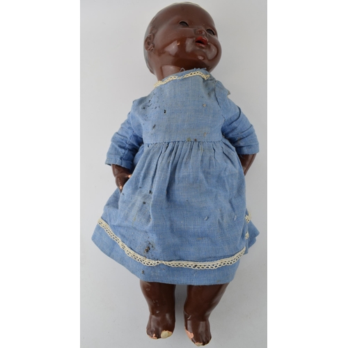 254 - A 'Dollies' 3 doll British Made, moving eyes, Height 46cm.