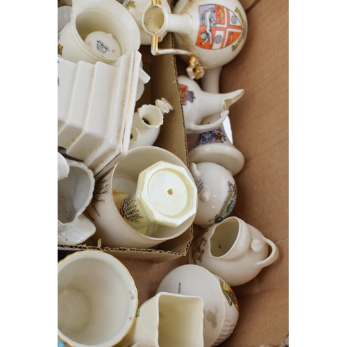 19 - A collection of crested china items to include animals, jugs, vases and varying forms and decoration... 