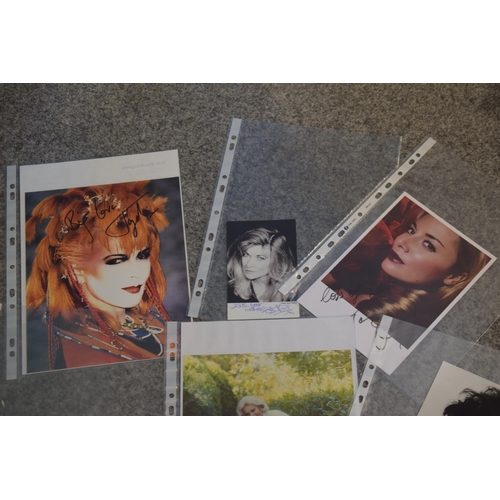 110 - A collection of autographs and facsimiles on studio photographs, some with printed certificates, to ... 