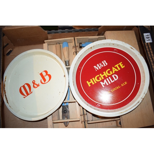 181 - A mixed collection of items to include a vintage childrens woodworking set together with three pub t... 