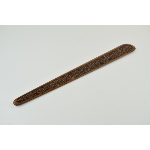 184 - A hand-carved page turner with hand painted crest to obverse and letter 'B' inscribed. Length 44cm.