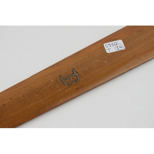 184 - A hand-carved page turner with hand painted crest to obverse and letter 'B' inscribed. Length 44cm.