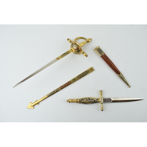 203 - A pair of novelty letter openers in the form of swords and daggers, 22cm longest (2).
