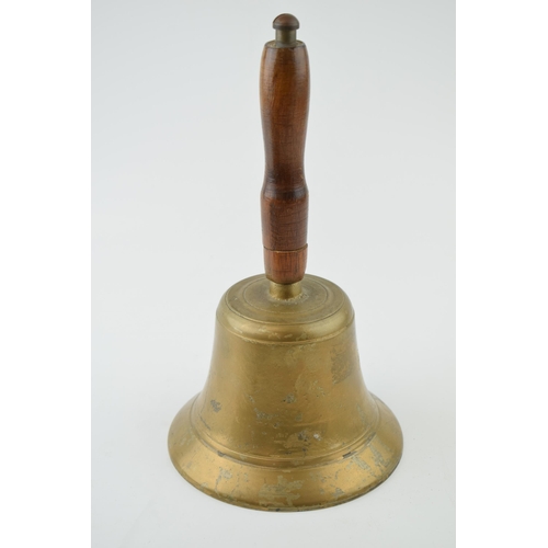 208 - Brass bell with government Cross-foot / Broad arrow mark to inside. Original wooden handle and dinge... 