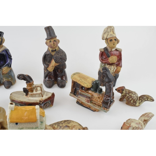 21 - A good collection of mostly Tremar studio pottery to include figures, a train, a car, animals and ot... 