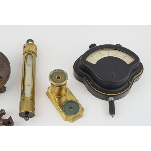 210 - A mixed collection of militara items to include various brass gauges, gun oiler, parts off a percuss... 