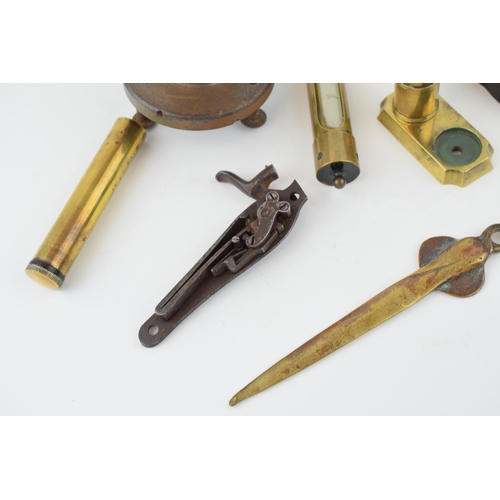 210 - A mixed collection of militara items to include various brass gauges, gun oiler, parts off a percuss... 