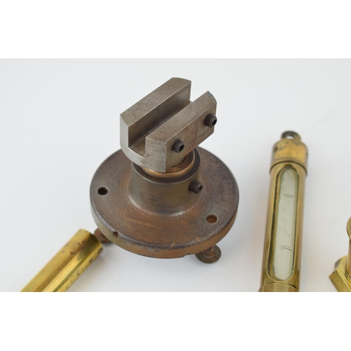 210 - A mixed collection of militara items to include various brass gauges, gun oiler, parts off a percuss... 