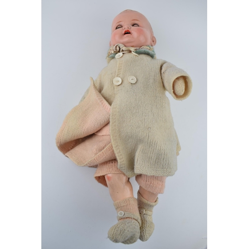 258 - An AM doll 580 3 1/2 K with moving eyes. Height 47cm.