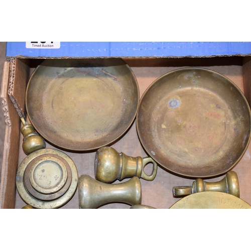 261 - A collection of brass weights, scale pans and the base of a trench art shell, RW297 RLB 1980. (Qty)