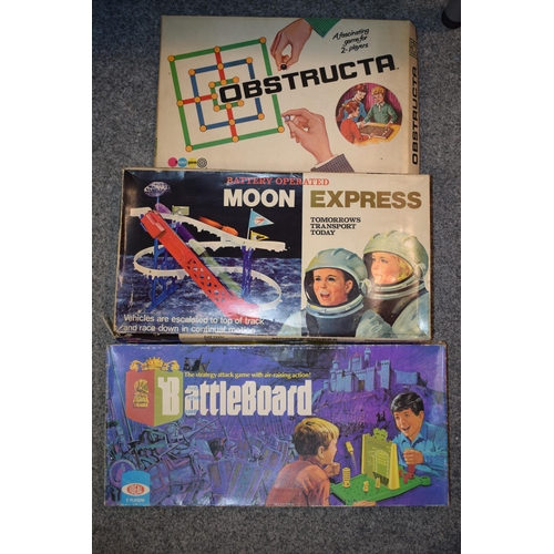 262 - A mixed collection of vintage board games to include, 'Moon Express', 'Obstructa' and 'Battleboard'.... 