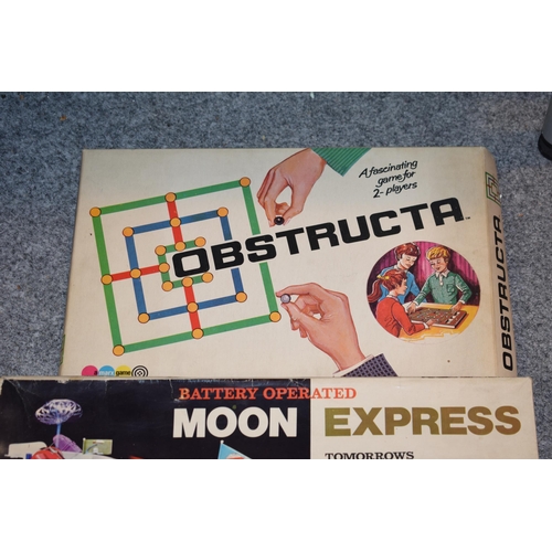 262 - A mixed collection of vintage board games to include, 'Moon Express', 'Obstructa' and 'Battleboard'.... 