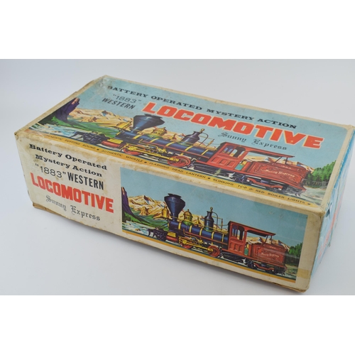 264 - A boxed vintage Locomotive '1883' Sunny Express battery operated toy train. Length 40cm.