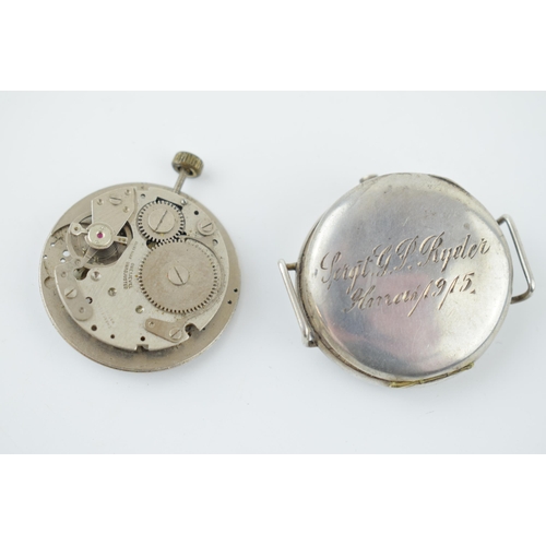 275 - A military style trench watch movement and outer case with inscribed date 1915. Case diameter 35mm.