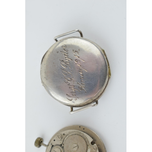 275 - A military style trench watch movement and outer case with inscribed date 1915. Case diameter 35mm.