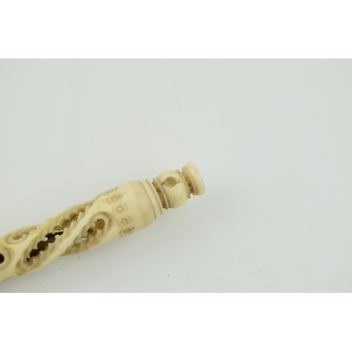 283 - A bone stanhope with integrated letter opener and pen. Length 23cm