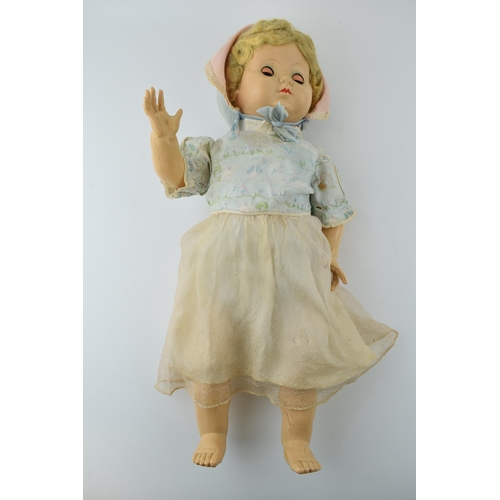 291 - Vintage Palitoy doll, Made in England c1950s. Moving eyes and period clothing. Height 51cm.