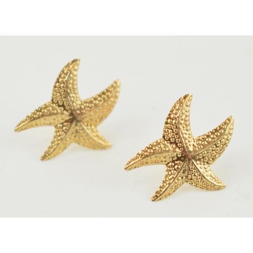 299 - A pair of 9ct gold earrings in the form of starfish, 0.4 grams.