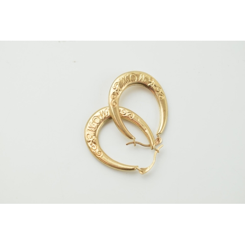 302 - A pair of 9ct gold earrings, 0.8 grams, 26mm.