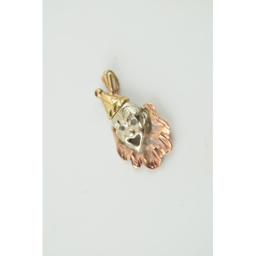 305 - 9ct gold pendant in the form of a clowns face, multi coloured, 1.8 grams, 28mm.