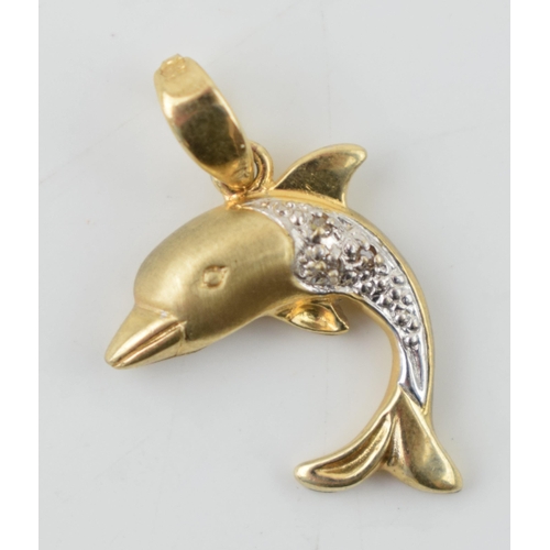 307 - 9ct gold pendant in the form of a dolphin, illusion set diamonds, 1.4 grams, 25mm long.