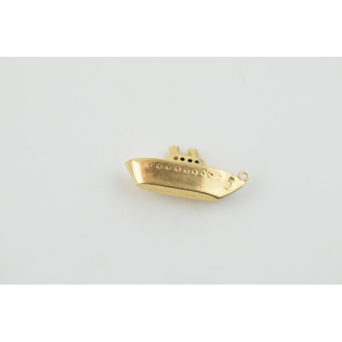 313 - 9ct gold charm in the form of a cruiseliner, 0.9 grams.