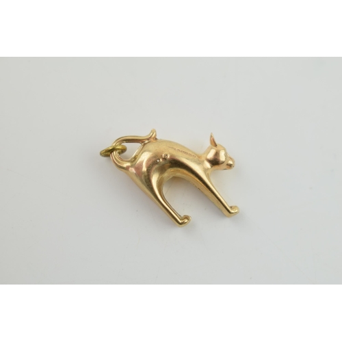 316 - 9ct gold charm in the form of a stretching cat, 1.3 grams.