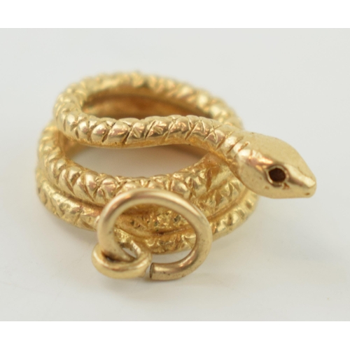 9ct gold pendant charm in the form of a curled snake, 3.2 grams, 17mm.