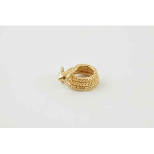 317 - 9ct gold pendant charm in the form of a curled snake, 3.2 grams, 17mm.