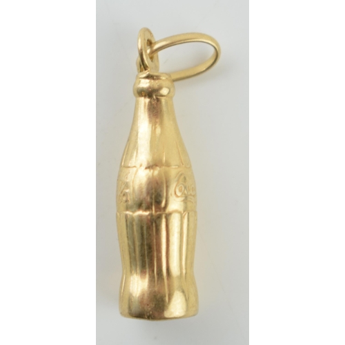 320 - 9ct gold charm in the form of a coca cola bottle,