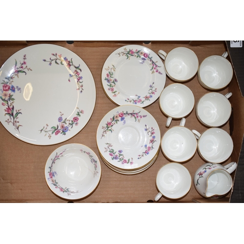 76 - Wedgwood part tea set in a floral design to include 7 cups, 8 saucers, 6 sides, a milk jug and a sug... 