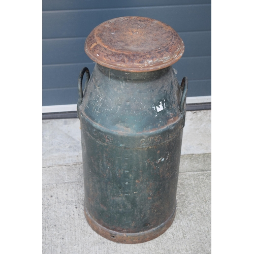 531 - Vintage milk churn 'CWS', 74cm tall, painted green.