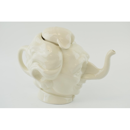 109 - Spitting Image Margaret Thatcher teapot by Fluck and Law, made by Carlton Ware, unmarked, 31cm long.