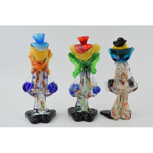 120 - A trio of Murano glass clowns, 22cm tall (3).