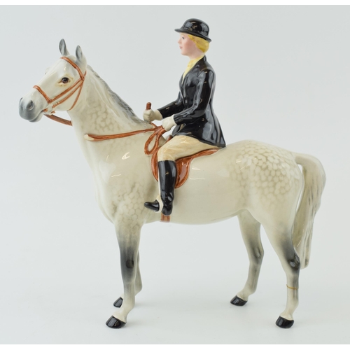 136 - Beswick Huntswoman on grey horse 1730 (back left leg glued).