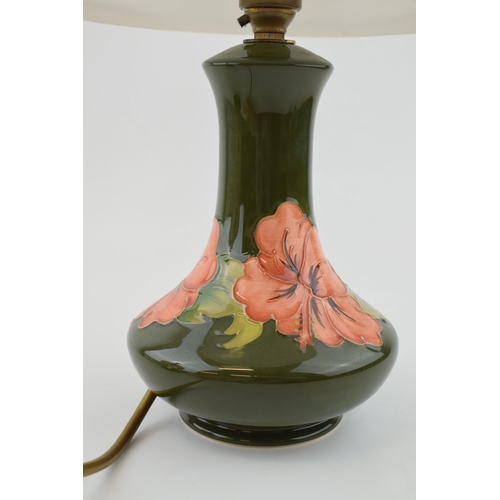 21 - Moorcroft Hibiscus lampbase, low shouldered, with associated shade, 18.5cm tall.